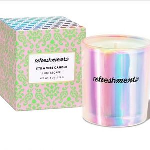 REFRESHMENTS IT'S A VIBE CANDLE IN LUSH ESCAPE.